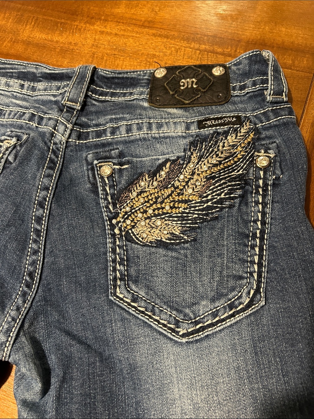 Miss Me Dark Blue Bootcut Jeans with Gold & Black Embroidered Wing